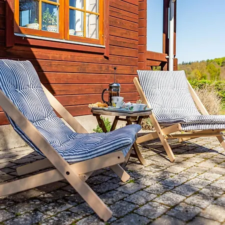 Vakantiehuis Wooden House Overlooking Svanninge Bakker